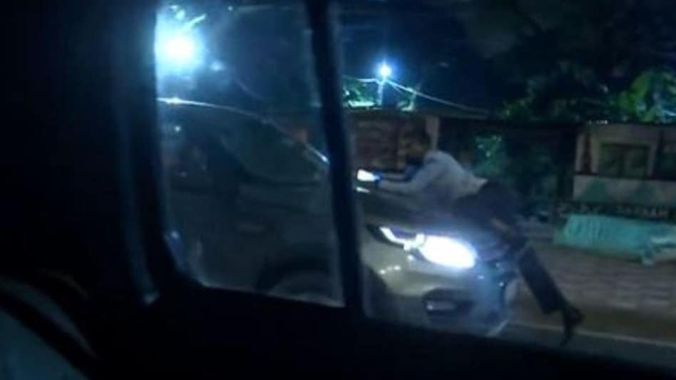 According to the accused, the cab driver deliberately jumped on the bonnet of his car and refused to get down. According to the accused, the cab driver deliberately jumped on the bonnet of his car and refused to get down.