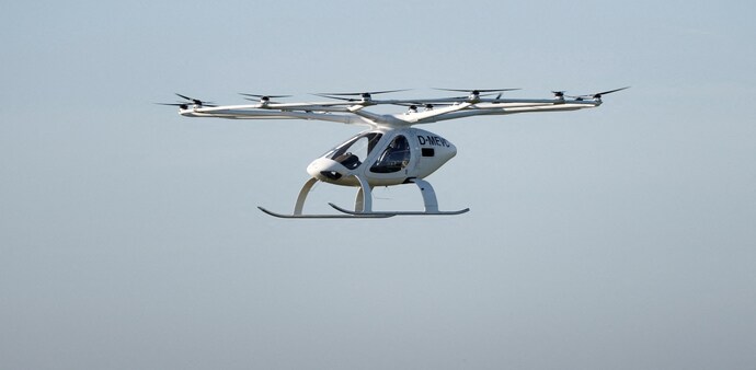 A Volocopter 2X drone taxi performs an integrated flight in conventional air traffic A Volocopter 2X drone taxi performs an integrated flight in conventional air traffic