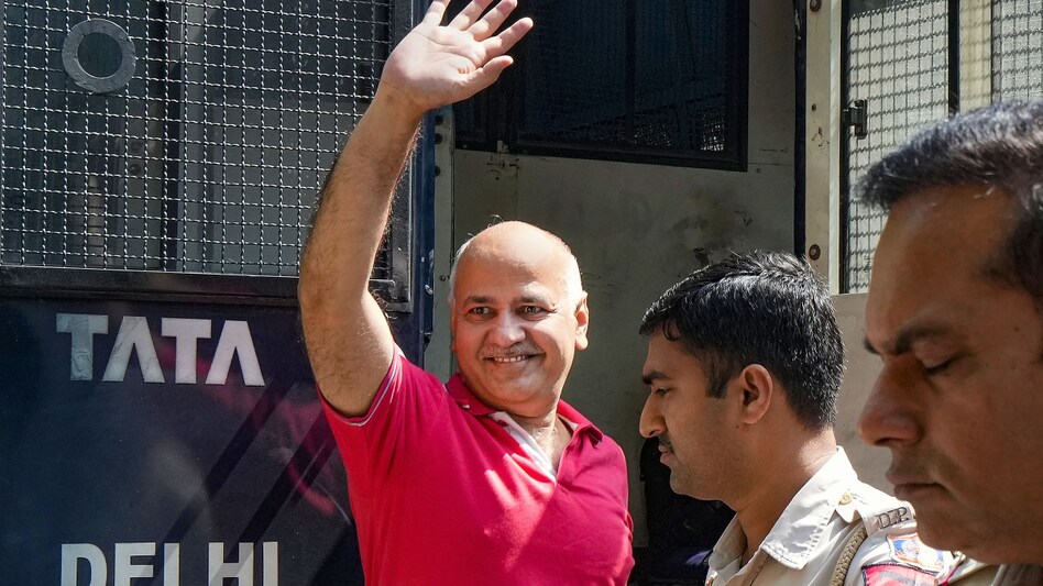 AAP leader Manish Sisodia arrives at his residence in New Delhi AAP leader Manish Sisodia arrives at his residence in New Delhi
