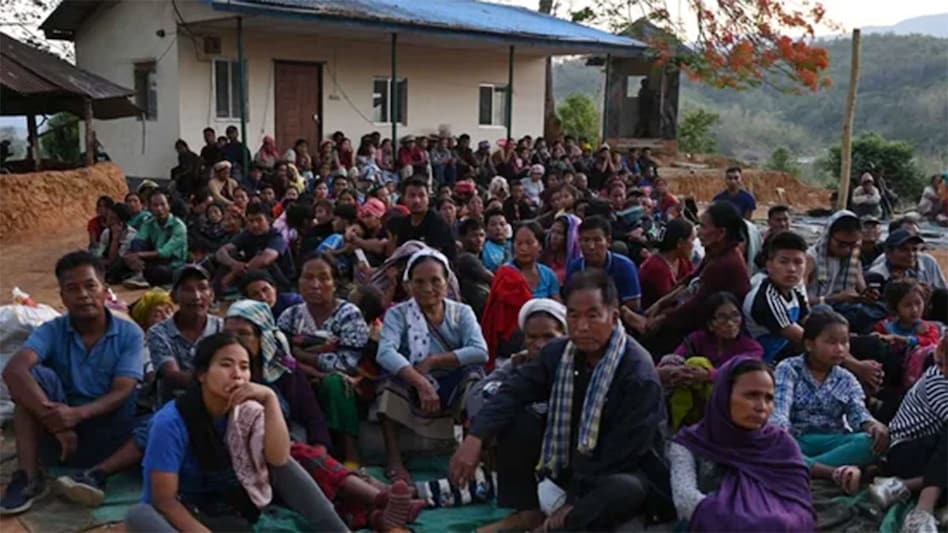 People at a temporary shelter People at a temporary shelter