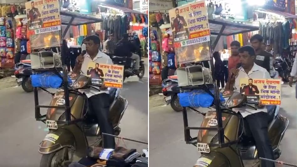 The man in the video was seen strapped to his scooter with contraptions including posters against the actor and a loudspeaker in the midst of a busy marketplace. The man in the video was seen strapped to his scooter with contraptions including posters against the actor and a loudspeaker in the midst of a busy marketplace.