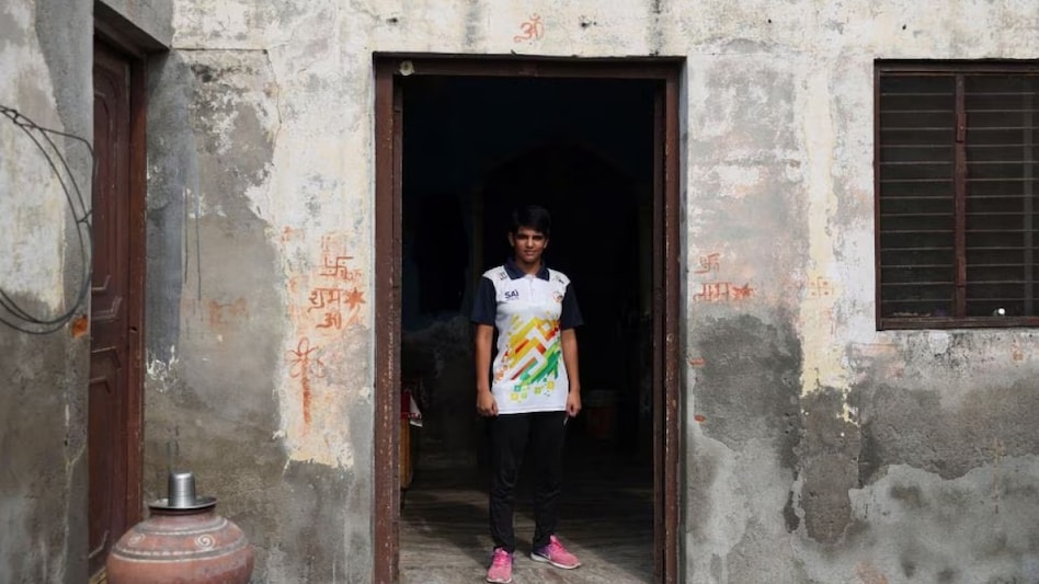 shanshu Dahiya,16, a wrestler poses for a picture at her residence in Kharkhoda in northern state of Haryana, India shanshu Dahiya,16, a wrestler poses for a picture at her residence in Kharkhoda in northern state of Haryana, India