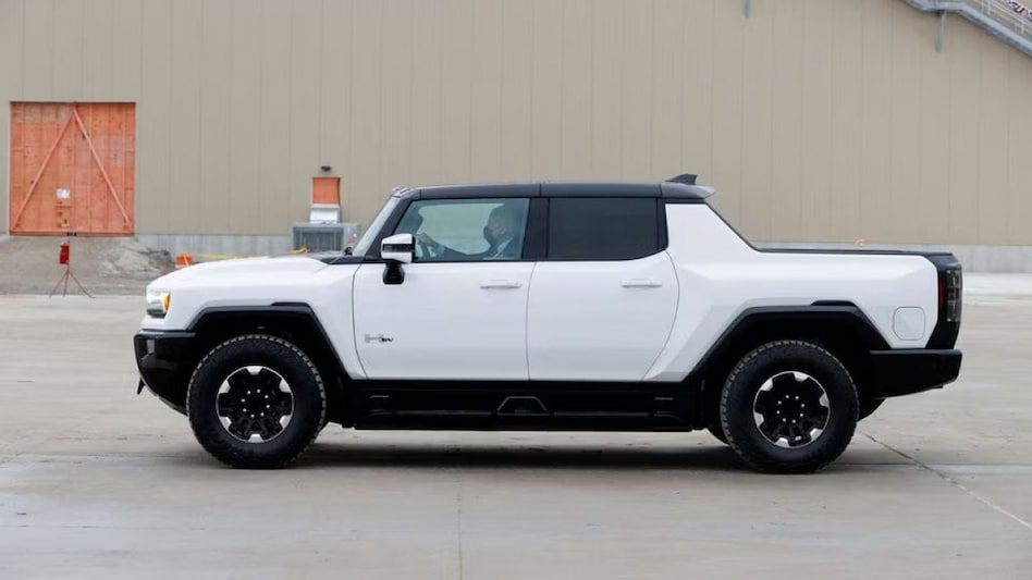 U.S. President Joe Biden drives a Hummer EV as he tours the General Motors 'Factory ZERO' electric vehicle assembly plant in Detroit, Michigan, U.S. U.S. President Joe Biden drives a Hummer EV as he tours the General Motors 'Factory ZERO' electric vehicle assembly plant in Detroit, Michigan, U.S.