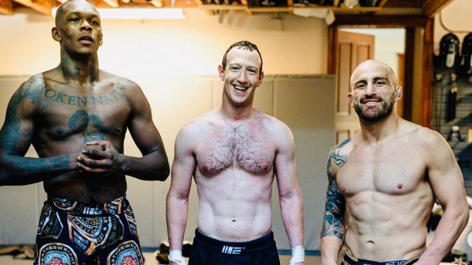 Mark Zuckerberg with two professional MMA fighters Mark Zuckerberg with two professional MMA fighters