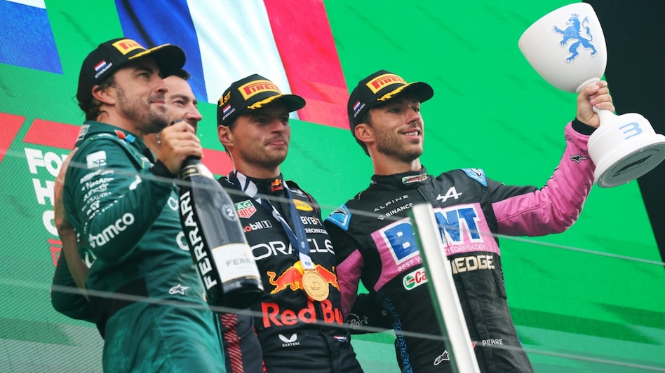 Red Bull's Max Verstappen celebrates on the on the podium after winning the Dutch Grand Prix with second placed Aston Martin's Fernando Alonso and third placed Alpine's Pierre Gasly REUTERS/Stephanie Lecocq Red Bull's Max Verstappen celebrates on the on the podium after winning the Dutch Grand Prix with second placed Aston Martin's Fernando Alonso and third placed Alpine's Pierre Gasly REUTERS/Stephanie Lecocq