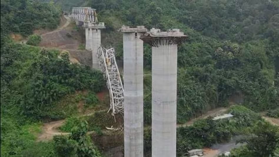 The under-construction railway bridge collapsed near Sairang area of Mizoram on Wednesday. The under-construction railway bridge collapsed near Sairang area of Mizoram on Wednesday.
