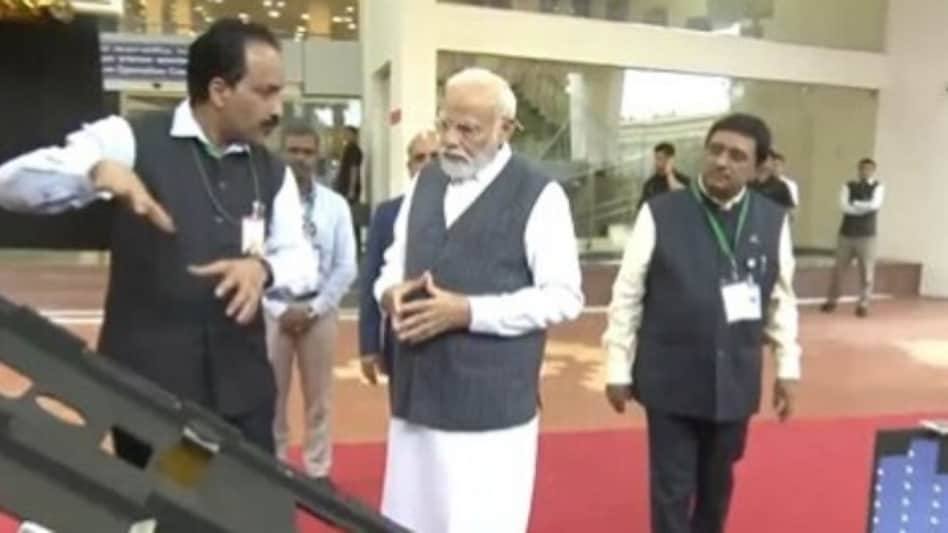 Isro chairman S Somanath shows PM Narendra Modi a replica of Vikram lander. Isro chairman S Somanath shows PM Narendra Modi a replica of Vikram lander.