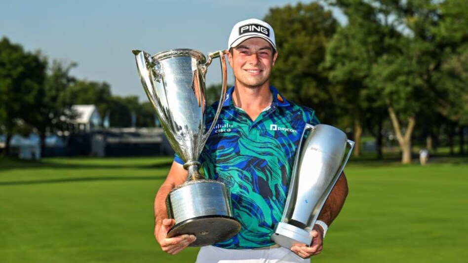 Norway’s Viktor Hovland with his BMW Championship trophies at Olympia Fields Country Club on Sunday. Image courtesy PGA Tour/Getty Images Norway’s Viktor Hovland with his BMW Championship trophies at Olympia Fields Country Club on Sunday. Image courtesy PGA Tour/Getty Images