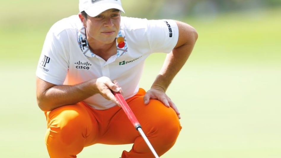 Overnight leader and second seed Viktor Hovland lines up a putt at the East Lake course in Atlanta on Sunday. Image courtesy pgatour.com. Overnight leader and second seed Viktor Hovland lines up a putt at the East Lake course in Atlanta on Sunday. Image courtesy pgatour.com.