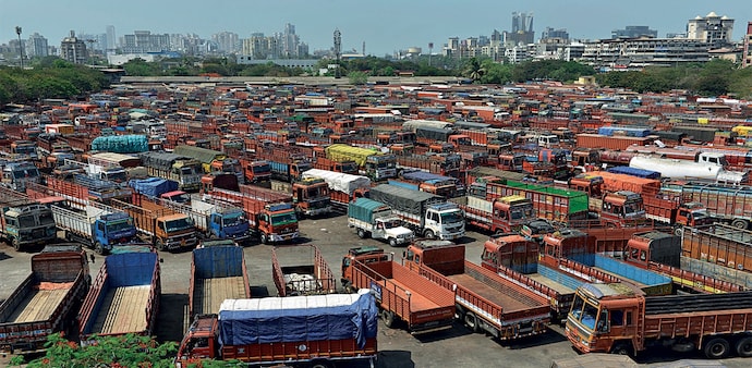 Trucks parked near Navi Mumbai’s APMC market. Transport is a key component of the services sector. (Photo: Mandar Deodhar) Trucks parked near Navi Mumbai’s APMC market. Transport is a key component of the services sector. (Photo: Mandar Deodhar)