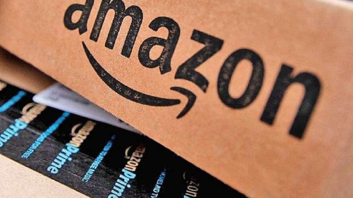 A close-up of a cardboard box with the Amazon logo on it
