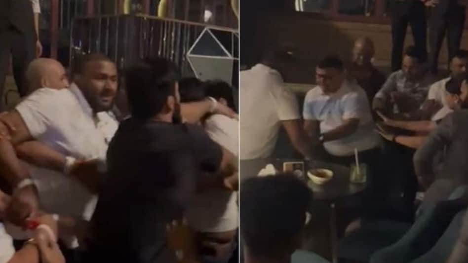 The video shows several people punching and kicking each other. The video shows several people punching and kicking each other.