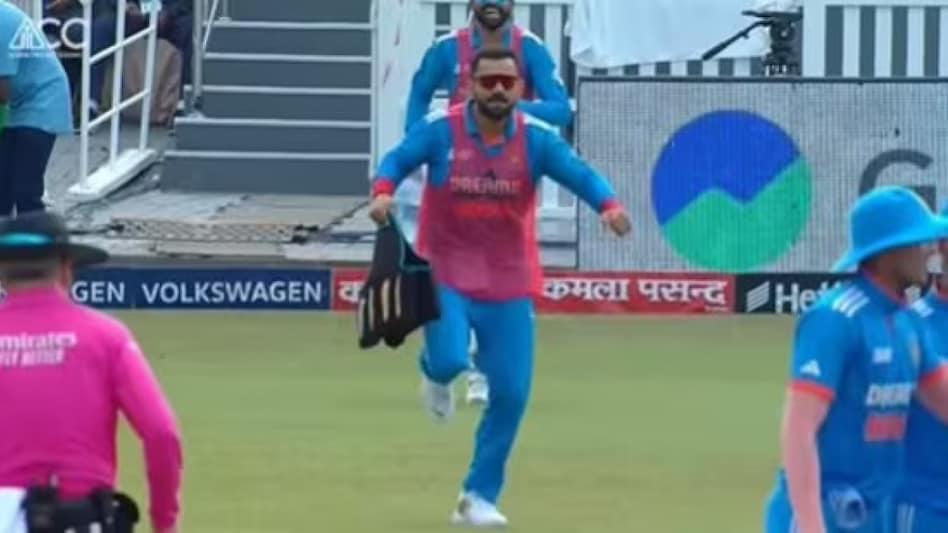 The video has gone viral because of Kohli’s antics as he is running towards the centre of the field. The video has gone viral because of Kohli’s antics as he is running towards the centre of the field.