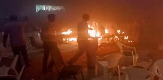 The man, who has been identified as Dominic Martin, surrendered before the police and took responsibility for the blasts which killed one and injured 40. The man, who has been identified as Dominic Martin, surrendered before the police and took responsibility for the blasts which killed one and injured 40.