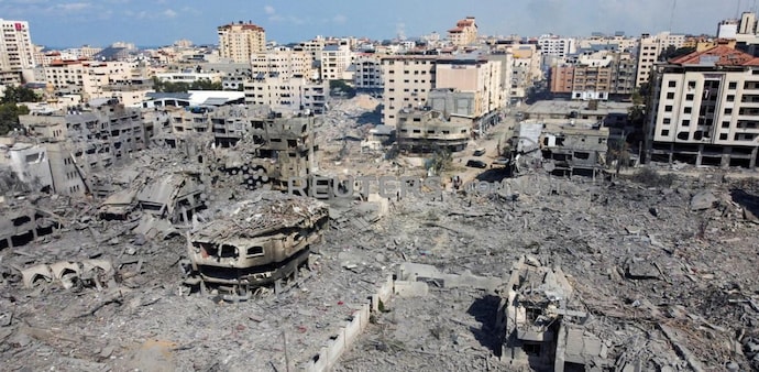 Houses and buildings destroyed by Israeli strikes in Gaza (Reuters) Houses and buildings destroyed by Israeli strikes in Gaza (Reuters)