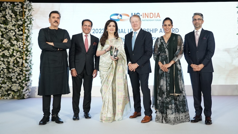 Dr Mukesh Aghi, USISPF President and CEO, congratulated Ambani on her achievement Dr Mukesh Aghi, USISPF President and CEO, congratulated Ambani on her achievement