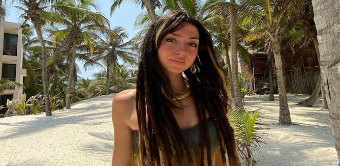 While her face could not be seen in the video, Shani Louk's family identified her by her characteristic dreadlocks and the tattoos on her body While her face could not be seen in the video, Shani Louk's family identified her by her characteristic dreadlocks and the tattoos on her body