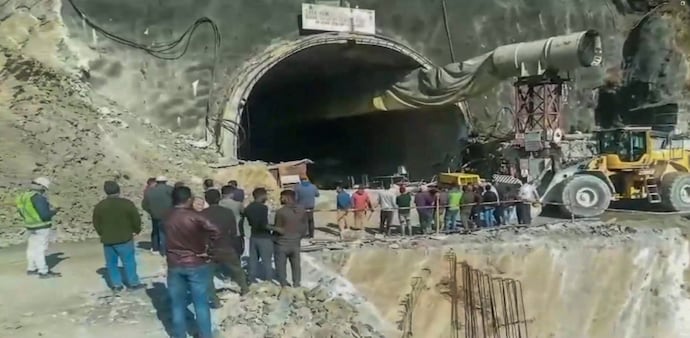 Rescue operation underway after a portion of a tunnel under construction between Silkyara and Dandalgaon on the Brahmakhal-Yamunotri national highway collapsed (PTI Photo) Rescue operation underway after a portion of a tunnel under construction between Silkyara and Dandalgaon on the Brahmakhal-Yamunotri national highway collapsed (PTI Photo)