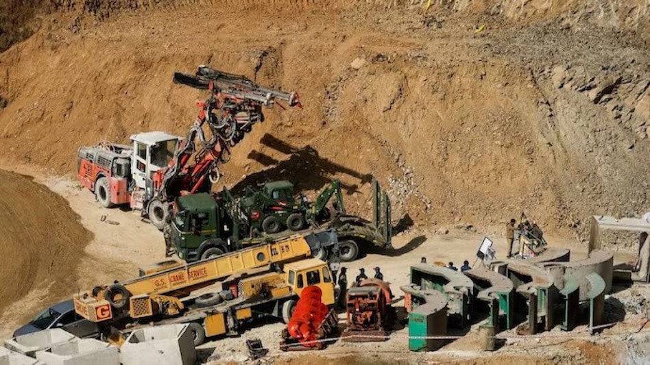 The goal is to drill at least 86 meters to reach the trapped workers. The Indian Army has also joined the operation, manually drilling the tunnel in collaboration with various government agencies The goal is to drill at least 86 meters to reach the trapped workers. The Indian Army has also joined the operation, manually drilling the tunnel in collaboration with various government agencies