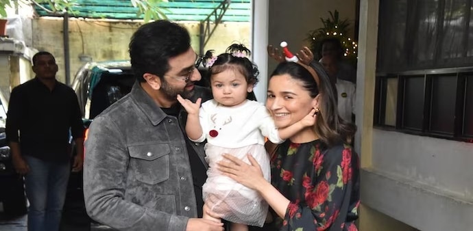 The star couple kept kissing their daughter as they thanked the photographers for their remarks on Raha and said "thank you" multiple times. The star couple kept kissing their daughter as they thanked the photographers for their remarks on Raha and said "thank you" multiple times.