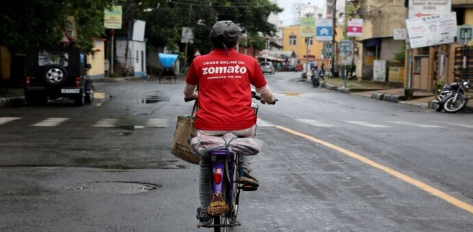 Zomato rider delivering food Zomato rider delivering food