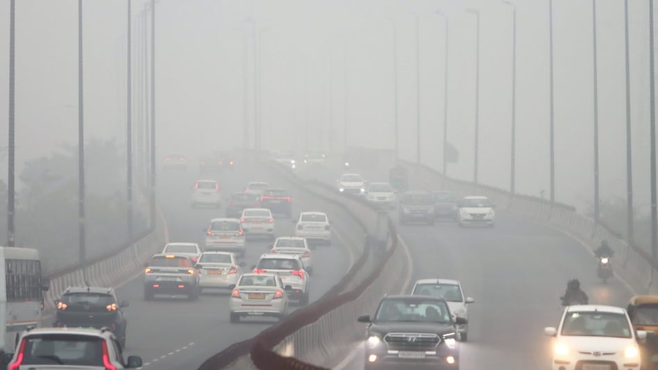 New Delhi: A thick layer of fog engulfs the Barapullah Flyover, in New Delhi (PTI) New Delhi: A thick layer of fog engulfs the Barapullah Flyover, in New Delhi (PTI)