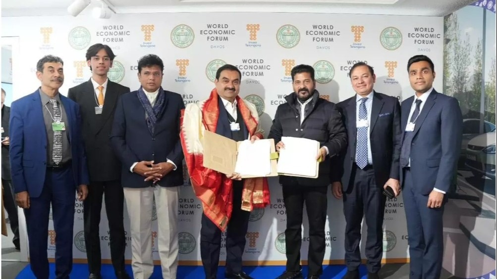 Adani Group chairman Gautam Adani with Chief Minister Revanth Reddy in Davos on Wednesday. Adani Group chairman Gautam Adani with Chief Minister Revanth Reddy in Davos on Wednesday.
