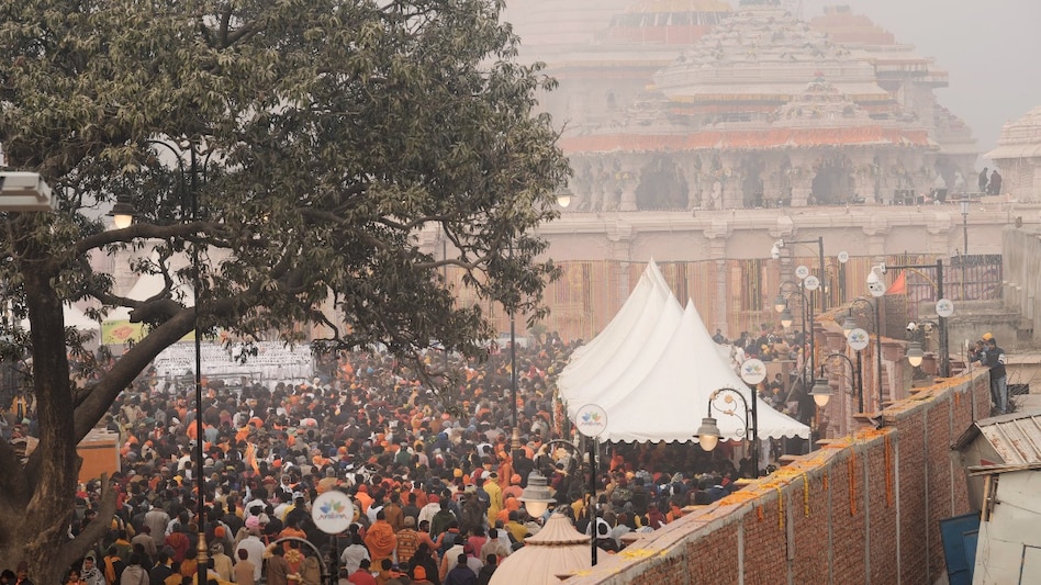 Large number of devotees gather to enter the Ram temple, in Ayodhya, Tuesday (PTI) Large number of devotees gather to enter the Ram temple, in Ayodhya, Tuesday (PTI)