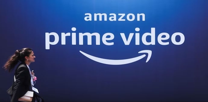 A woman walks past a hoarding of Amazon Prime Video during an Amazon Prime Video India launch event in Mumbai. (File photo: Reuters) A woman walks past a hoarding of Amazon Prime Video during an Amazon Prime Video India launch event in Mumbai. (File photo: Reuters)