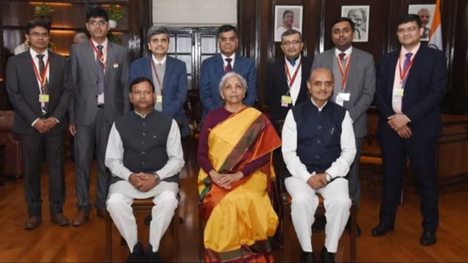 Union finance minister Nirmala Sitharaman poses with her team a day prior to the Budget. Union finance minister Nirmala Sitharaman poses with her team a day prior to the Budget.