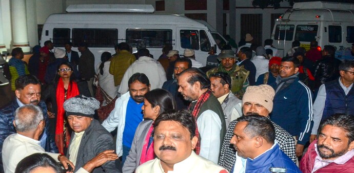 Jharkhand ruling alliance's MLAs wait outside the Raj Bhavan, in Ranchi Jharkhand ruling alliance's MLAs wait outside the Raj Bhavan, in Ranchi