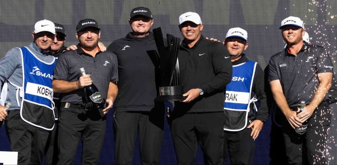 Members of the winning Smash GC team and their caddies on the victory step of the LIV Golf Las Vegas podium on Saturday. Image courtesy livgolf.com. Members of the winning Smash GC team and their caddies on the victory step of the LIV Golf Las Vegas podium on Saturday. Image courtesy livgolf.com.