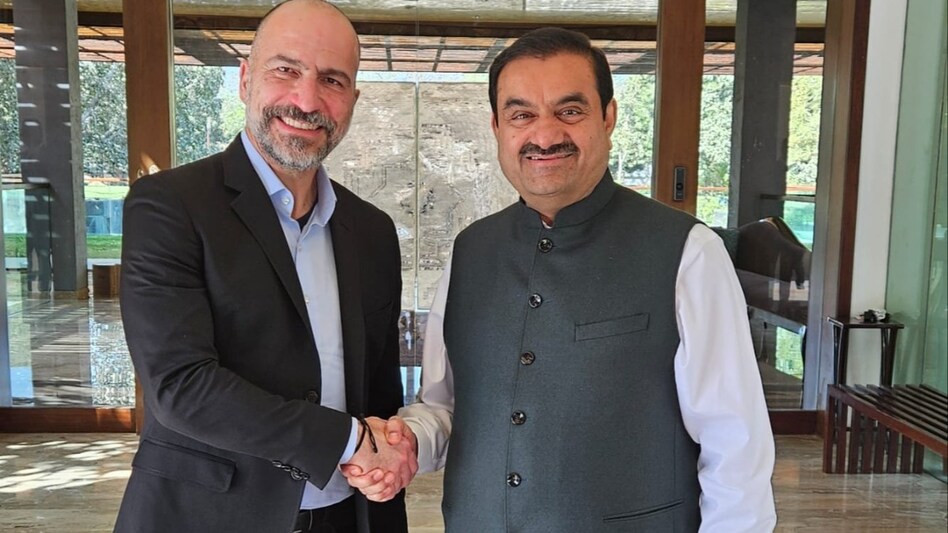 Uber CEO Dara Khosrowshahi with Gautam Adani Uber CEO Dara Khosrowshahi with Gautam Adani