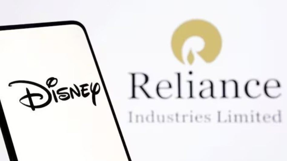 Walt Disney, Reliance signs pact to merge media businesses Walt Disney, Reliance signs pact to merge media businesses