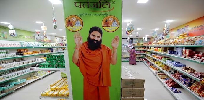 SC warned Patanjali that it would be fined Rs 1 crore if a false claim is made that its products can "cure" certain diseases. SC warned Patanjali that it would be fined Rs 1 crore if a false claim is made that its products can "cure" certain diseases.