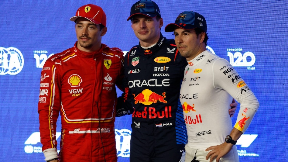 Red Bull's Max Verstappen with Ferrari's Charles Leclerc and Red Bull's Sergio Perez Red Bull's Max Verstappen with Ferrari's Charles Leclerc and Red Bull's Sergio Perez