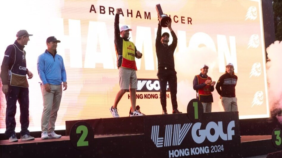 Hong Kong individual winner Abraham Ancer of Mexico on the top step of the podium on Sunday with his caddie Benji Thompson. Image courtesy livgolf.com. Hong Kong individual winner Abraham Ancer of Mexico on the top step of the podium on Sunday with his caddie Benji Thompson. Image courtesy livgolf.com.