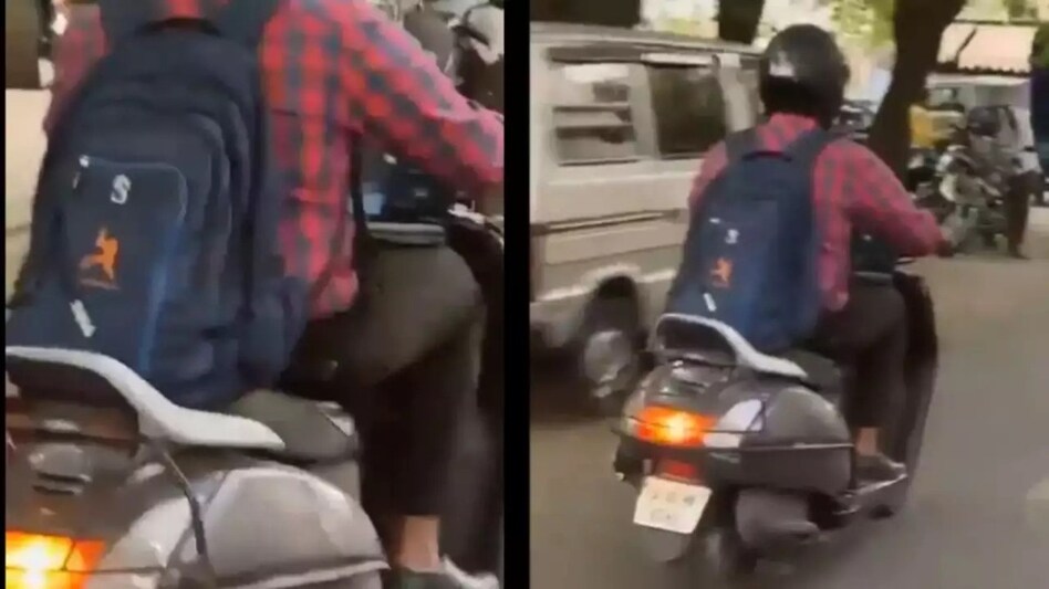 The viral video depicting a man balancing a laptop while riding a scooter garnered attention on social media. Netizens responded with a mix of humor and empathy towards the man's situation. The viral video depicting a man balancing a laptop while riding a scooter garnered attention on social media. Netizens responded with a mix of humor and empathy towards the man's situation.