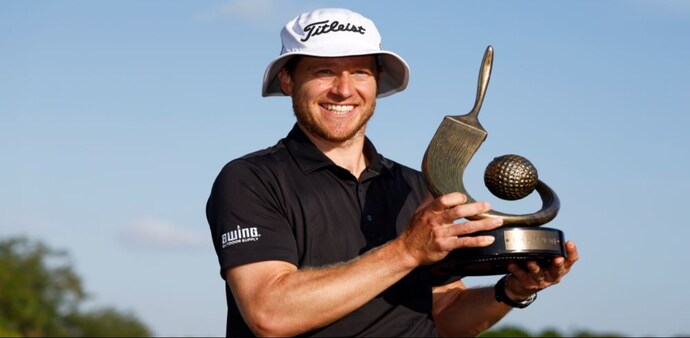 Peter Malnati with the Valspar Championship trophy in Palm Harbour, Florida, on Sunday. Image courtesy PGA Tour/Getty Images. Peter Malnati with the Valspar Championship trophy in Palm Harbour, Florida, on Sunday. Image courtesy PGA Tour/Getty Images.
