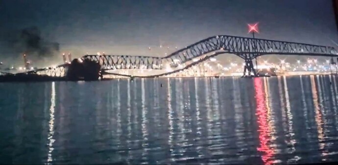 The bridge collapsed after a cargo ship experienced a power failure and collided with it. The bridge collapsed after a cargo ship experienced a power failure and collided with it.