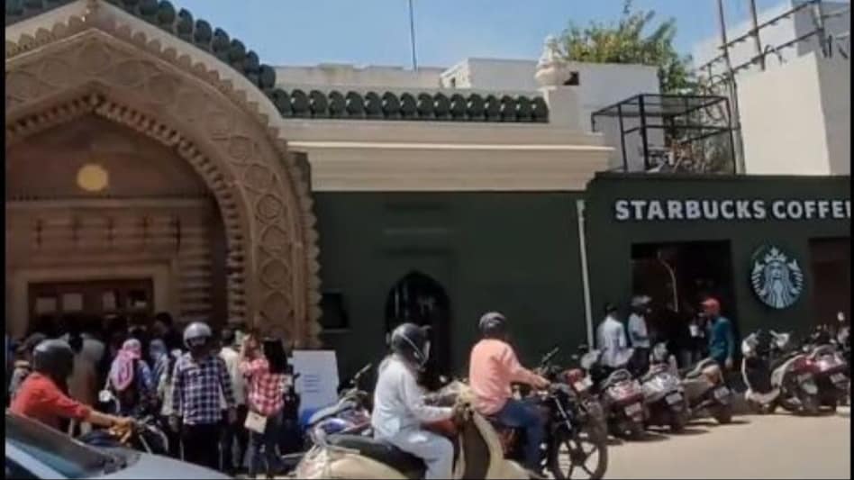 A video circulating online shows a packed Starbucks outlet in Varanasi, with customers jostling for space inside and a queue waiting outside A video circulating online shows a packed Starbucks outlet in Varanasi, with customers jostling for space inside and a queue waiting outside