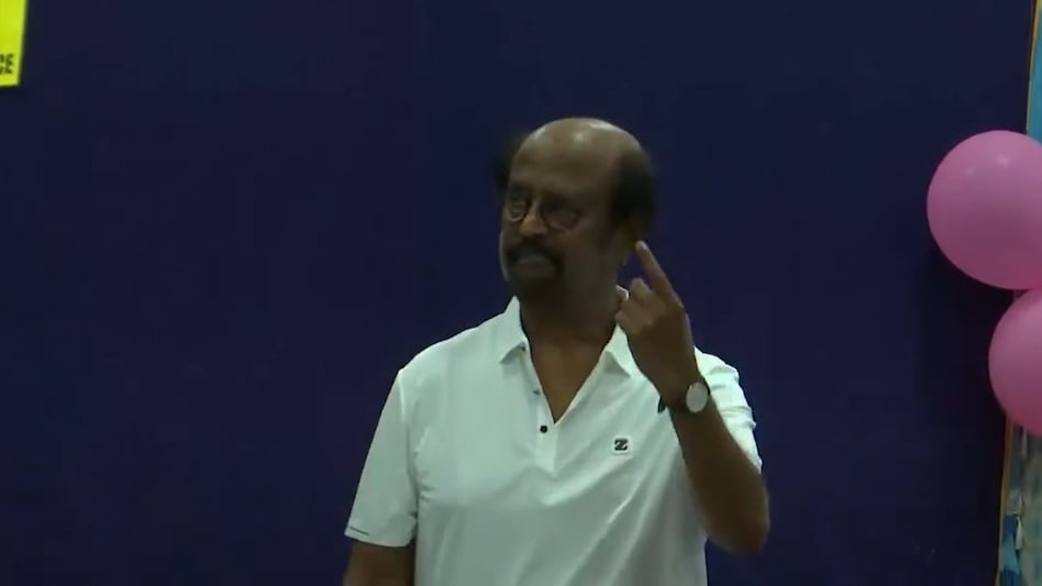 Actor Rajnikanth casts his vote at a polling booth in Chennai Actor Rajnikanth casts his vote at a polling booth in Chennai