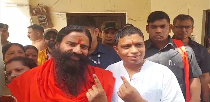 Yog Guru Baba Ramdev & Acharya Balkrishna Cast Vote in Haridwar Yog Guru Baba Ramdev & Acharya Balkrishna Cast Vote in Haridwar