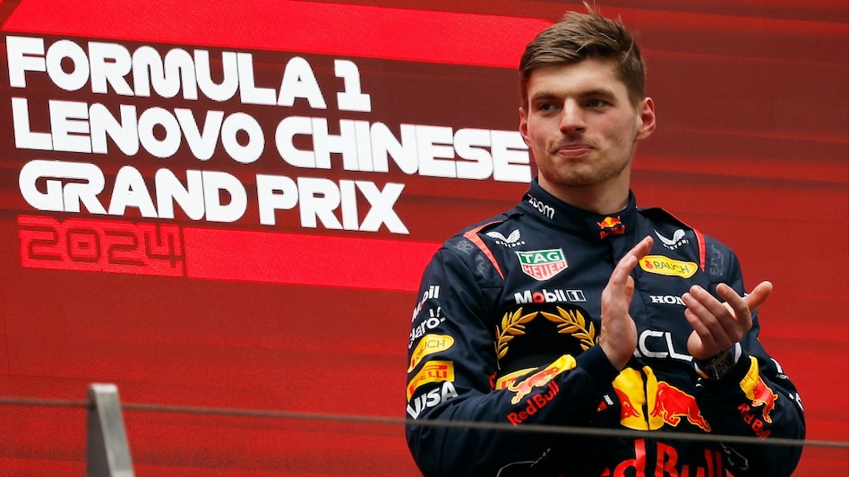 Formula One F1 - Chinese Grand Prix - Shanghai International Circuit, Shanghai, China - April 21, 2024 Red Bull's Max Verstappen celebrates on the podium after winning the Chinese Grand Prix REUTERS/Tyrone Siu Formula One F1 - Chinese Grand Prix - Shanghai International Circuit, Shanghai, China - April 21, 2024 Red Bull's Max Verstappen celebrates on the podium after winning the Chinese Grand Prix REUTERS/Tyrone Siu