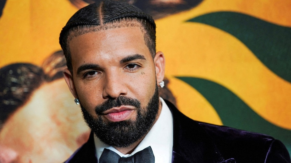FILE PHOTO: Drake attends the Amsterdam world premiere at Alice Tully Hall in New York, U.S., September 18, 2022. REUTERS/Eduardo Munoz/File Photo FILE PHOTO: Drake attends the Amsterdam world premiere at Alice Tully Hall in New York, U.S., September 18, 2022. REUTERS/Eduardo Munoz/File Photo