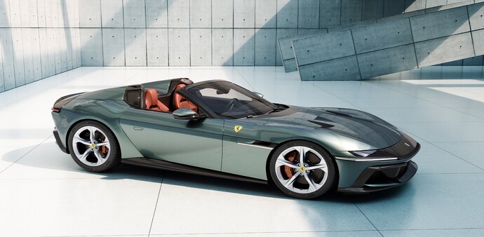 Weighing 1,560kg, the 12Cilindri is styled like a berlinetta-"little saloon" in Italian-with a glass roof that swoops low in the back. A novel design in front replaces traditional headlights with a single wraparound band. Photo: @Ferrari Weighing 1,560kg, the 12Cilindri is styled like a berlinetta-"little saloon" in Italian-with a glass roof that swoops low in the back. A novel design in front replaces traditional headlights with a single wraparound band. Photo: @Ferrari