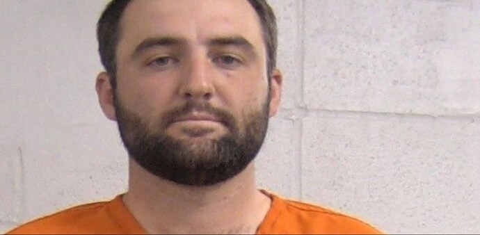 A Louisville Metropolitan Department of Corrections photo of world number one Scottie Scheffler during his detention with the LMPD on Friday. A Louisville Metropolitan Department of Corrections photo of world number one Scottie Scheffler during his detention with the LMPD on Friday.