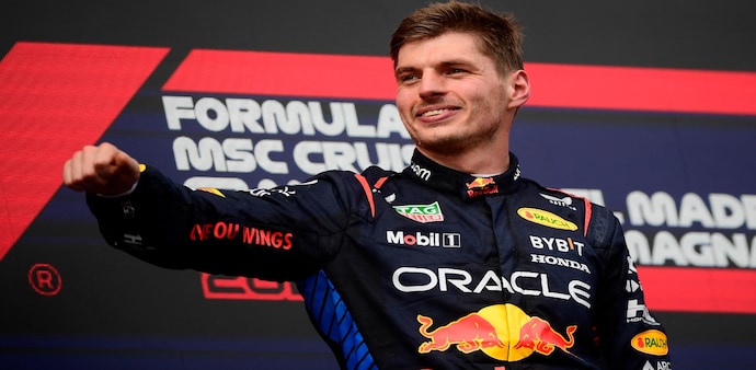 Formula One F1 - Emilia Romagna Grand Prix - Autodromo Enzo e Dino Ferrari, Imola, Italy - May 19, 2024 Red Bull's Max Verstappen celebrates on the podium after winning the Emilia Romagna Grand Prix REUTERS/Massimo Pinca Formula One F1 - Emilia Romagna Grand Prix - Autodromo Enzo e Dino Ferrari, Imola, Italy - May 19, 2024 Red Bull's Max Verstappen celebrates on the podium after winning the Emilia Romagna Grand Prix REUTERS/Massimo Pinca