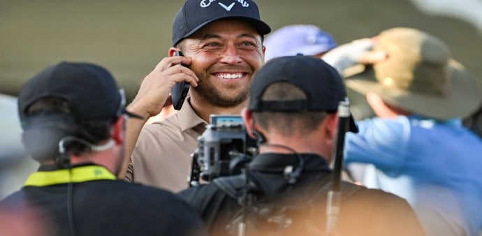 Xander Schauffele speaks with his father Stefan after winning the PGA Championship in Louisville, Kentucky on Sunday. (Image courtesy PGA Tour/Getty Images) Xander Schauffele speaks with his father Stefan after winning the PGA Championship in Louisville, Kentucky on Sunday. (Image courtesy PGA Tour/Getty Images)