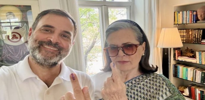 Rahul Gandhi and Sonia Gandhi flaunt their inked fingers after casting votes in Delhi. Rahul Gandhi and Sonia Gandhi flaunt their inked fingers after casting votes in Delhi.